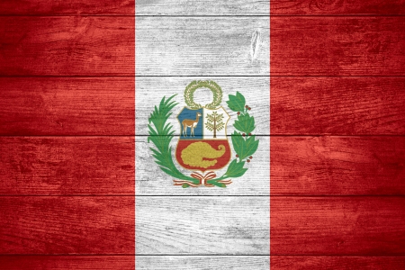 flag of Peru or Peruvian banner on wooden backgroundの写真素材