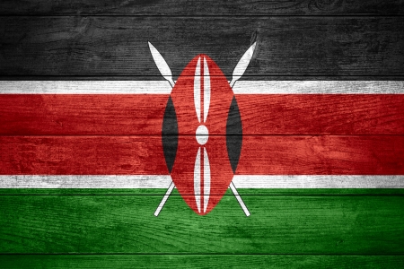 flag of Kenya or Kenyan banner on wooden backgroundの写真素材