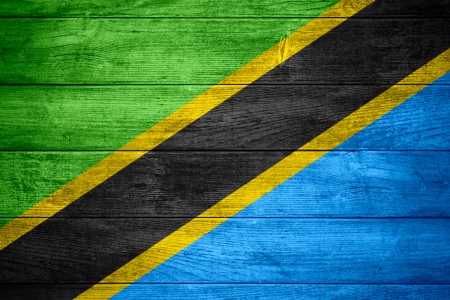 flag of Tanzania or Tanzanian,  banner on wooden backgroundの写真素材
