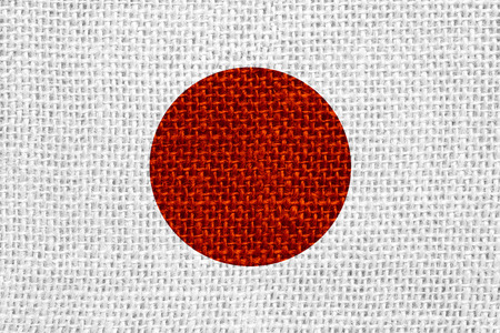 flag of Japan or Japanese banner on linen backgroundの写真素材