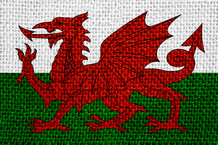 flag of Wales or Welsh banner on linen backgroundの写真素材