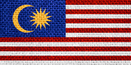 flag of Malaysia or Malaysian banner on linen backgroundの写真素材