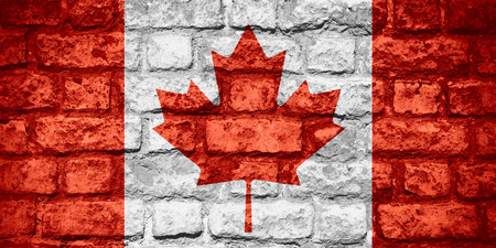 flag of Canada or Canadian banner on brick textureの写真素材