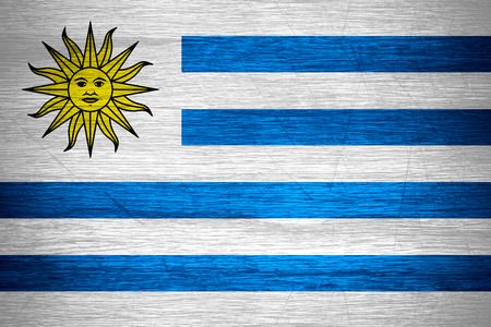 Uruguay flag or Uruguayan banner on wooden textureの写真素材