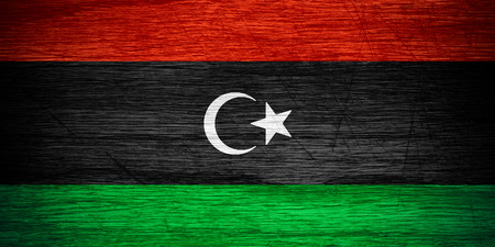 Libya flag or Libyan banner on wooden textureの写真素材