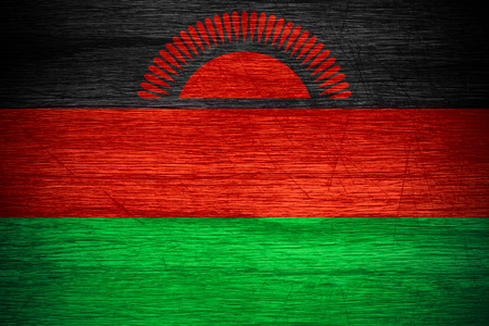 Malawi flag or banner on wooden textureの写真素材