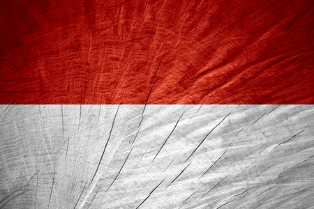 Indonesia flag or Indonesian banner on wooden textureの写真素材