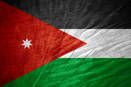 Jordan flag or Jordanian banner on wooden textureの写真素材
