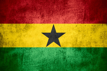 flag of Ghana or banner on rough pattern texture backgroundの写真素材