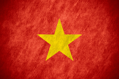 flag of Vietnam or Vietnamese banner on canvas textureの写真素材