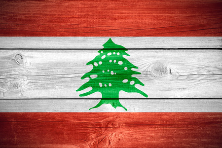 flag of Lebanon or Lebanese banner on wooden backgroundの写真素材