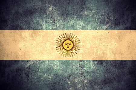flag of Argentina or Argentinian banner on rough pattern texture vintage backgroundの写真素材
