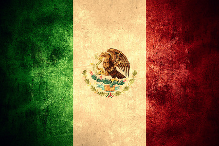 flag of Mexico or Mexican banner on rough pattern texture vintage backgroundの写真素材