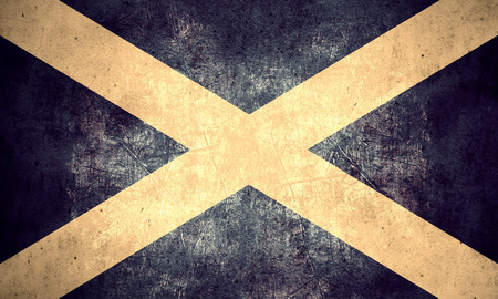 flag of Scotland or Scottish banner on rough pattern texture vintage backgroundの写真素材