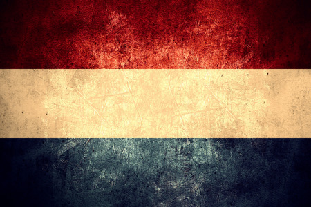 flag of Holland or Dutch banner on rough pattern texture vintage background, Netherlandsの写真素材