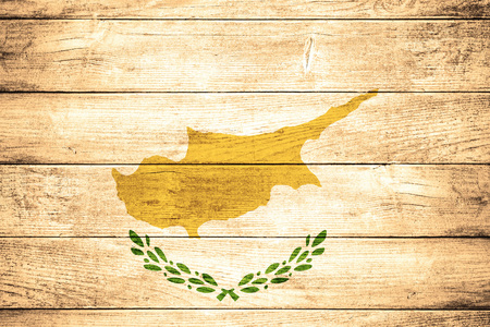 flag of Cyprus or Cypriot banner on wooden backgroundの写真素材