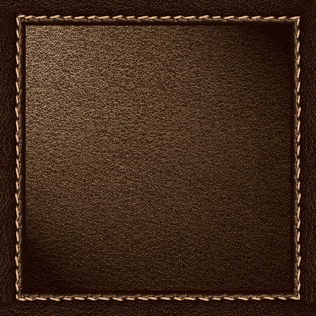brown leather texture background in dark frameの写真素材