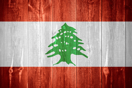 flag of Lebanon or Lebanese banner on wooden backgroundの写真素材