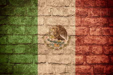 flag of Mexico or Mexican banner on brick textureの写真素材