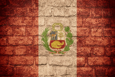 flag of Peru or Peruvian banner on brick textureの写真素材