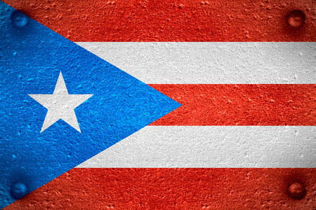 flag of Puerto Rico or Puerto Rican banner on steel backgroundの写真素材