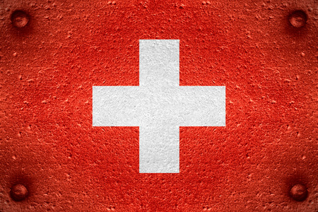 flag of Switzerland or Swiss banner on steel backgroundの写真素材