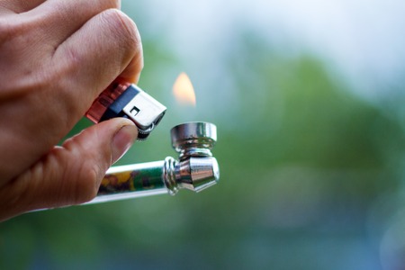 pipe for smoking medical marijuana a bunch of dry medicinal cannabis marijuana intended for smoking for medical purposes rastafaray hippiの写真素材