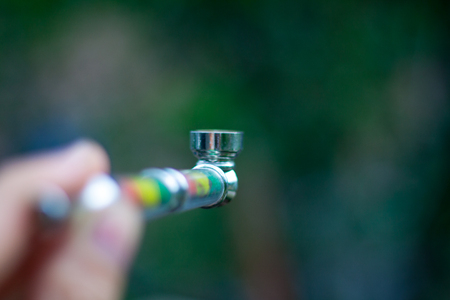 pipe for smoking medical marijuana a bunch of dry medicinal cannabis marijuana intended for smoking for medical purposes rastafaray hippiの写真素材