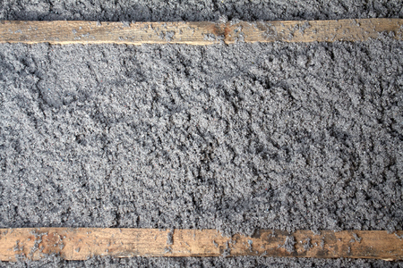 eco-friendly cellulose insulation made from recycled paper for building constructions, insulation for walls, ceiling insulation, insulation for floors, warm house, heat preservation, energy savingの写真素材