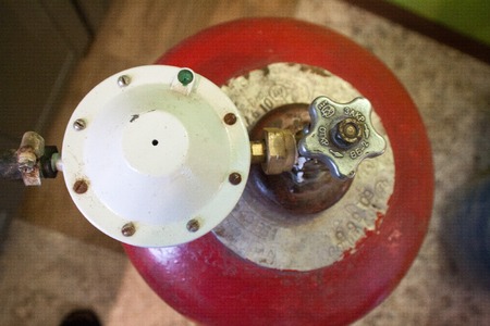 Gas cylinder with propane gas in the house cooking gas for cooking and heatingの写真素材
