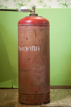 Gas cylinder with propane gas in the house cooking gas for cooking and heatingの写真素材
