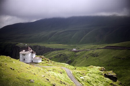 White country house in the mountains in the middle of the high mountains in the North Caucasus near...