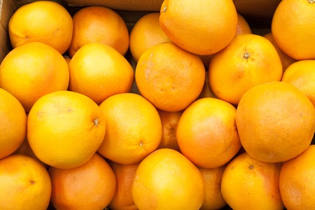 Ripe orange fruit oranges background oranges in a shop window selling orangesの写真素材