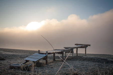 Morning on the river early morning reeds mist fog and water surface on the riverの写真素材