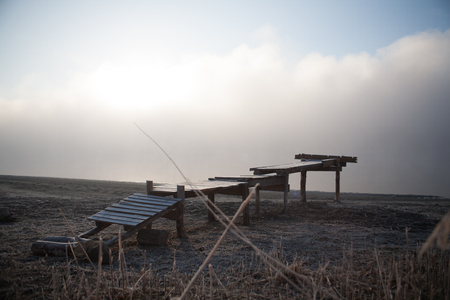 Morning on the river early morning reeds mist fog and water surface on the riverの写真素材