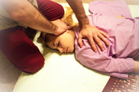therapeutic massage manual therapy for curing pain in the joints of the osteochondrosis of the spine of muscle relaxationの写真素材