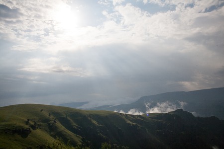 Landscape high mountains in dense fog tops of mountains in clouds North Caucasus Elbrusの写真素材