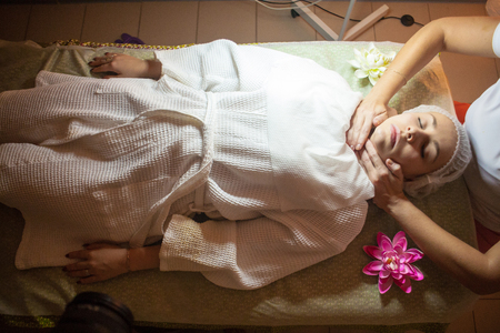 therapeutic massage manual therapy for curing pain in the joints of the osteochondrosis of the spine of muscle relaxationの写真素材