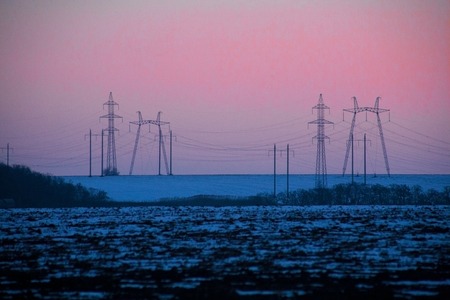 power lines Silhouette High voltage electric tower on sunset time and sky on sunset time background.の写真素材
