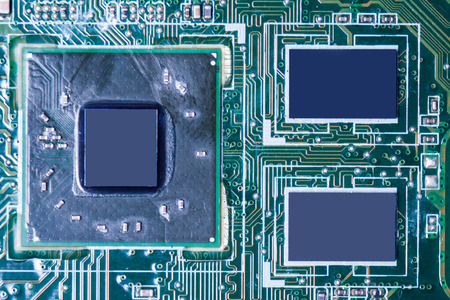 Close-up of electronic circuit board with chips and processors, motherboard laptop computer...
