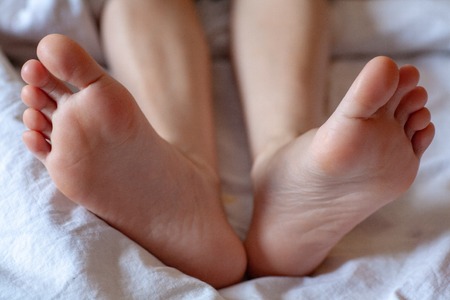 young girls toes are healthy and beautiful. Well-groomed toes. Concept for medical articles and...