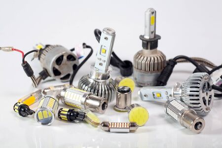 Light bulbs for car lamps. Automotive part in Silvery metallic and black color with wires and...