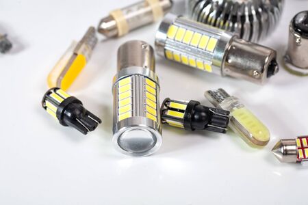 Light bulbs for car lamps. Automotive part in Silvery metallic and black color with wires and connecting elementsの写真素材