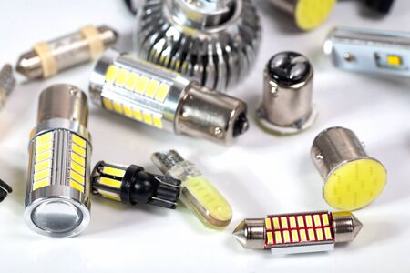 Light bulbs for car lamps. Automotive part in Silvery metallic and black color with wires and connecting elementsの写真素材