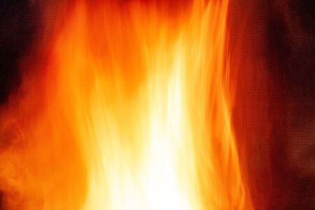 Texture of fire. Orange bright flame. Photo of a burning bonfire in a fire.