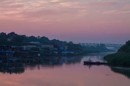 Morning on the river early morning reeds mist fog and water surface on the riverの写真素材
