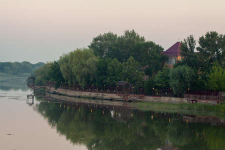 Morning on the river early morning reeds mist fog and water surface on the riverの写真素材