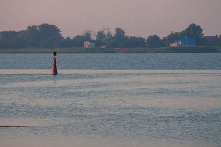 Morning on the river early morning reeds mist fog and water surface on the riverの写真素材