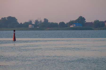 Morning on the river early morning reeds mist fog and water surface on the riverの写真素材