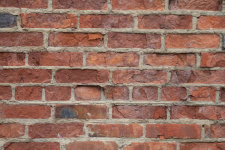 Real old brick wall crumbling from time to time